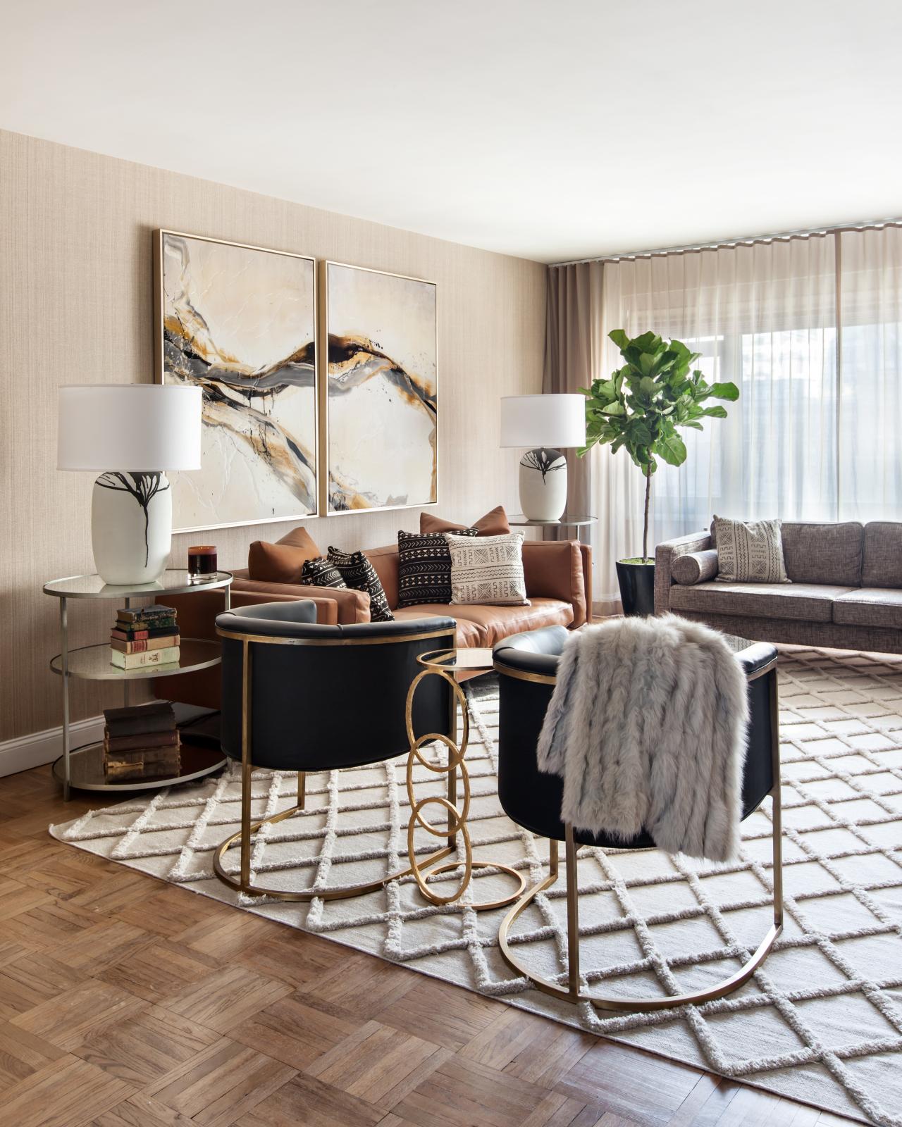The living room is one of the most important areas in your house for a great hosting experience. Textured Area Rug in Chic Manhattan Living Room | HGTV